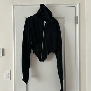 Cropped, raw edge hoodie.